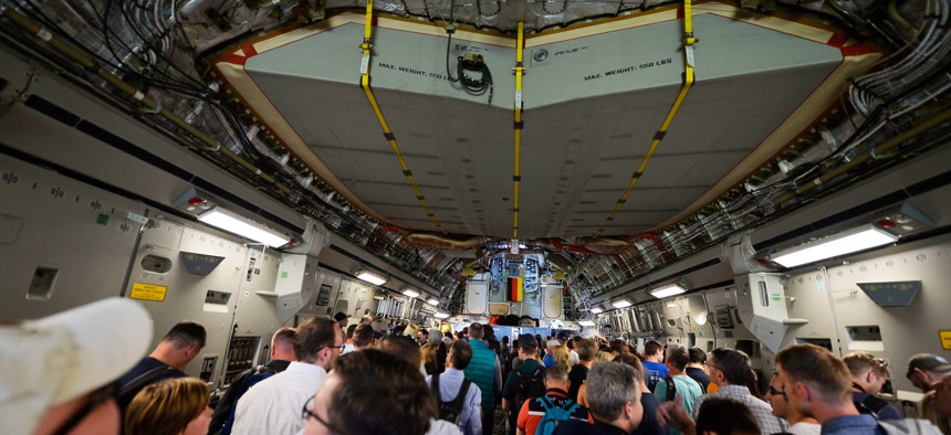 Visitors aboard a USAF C-17 at the 2018 Berlin Air and Trade Show.